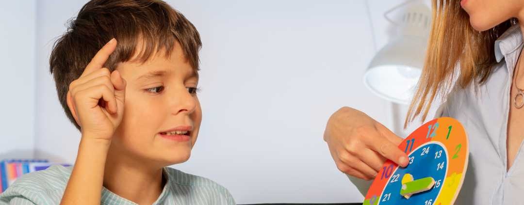 Autistic boy learning in school