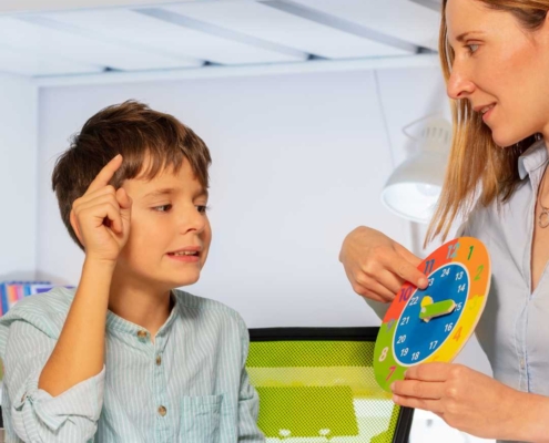 Autistic boy learning in school