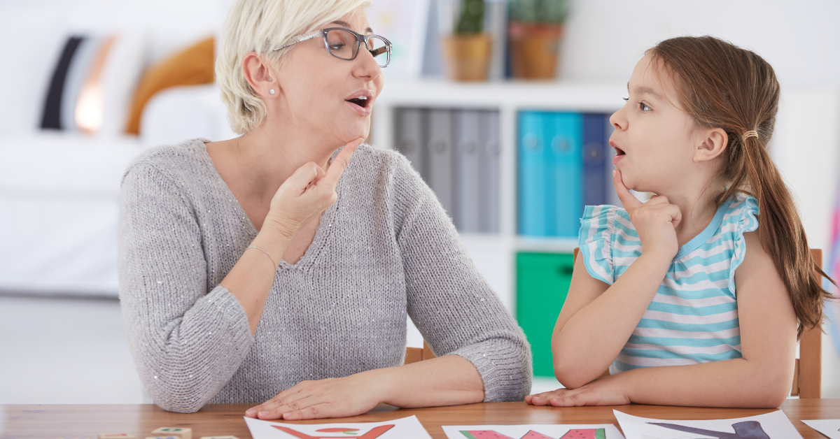 banner-children's-the-role-of-speech-therapy-in-early-childhood-development (1) young child with a speech language therapist working on speech skills