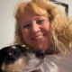 Sherry Phillips, a blonde woman pictured with her dog