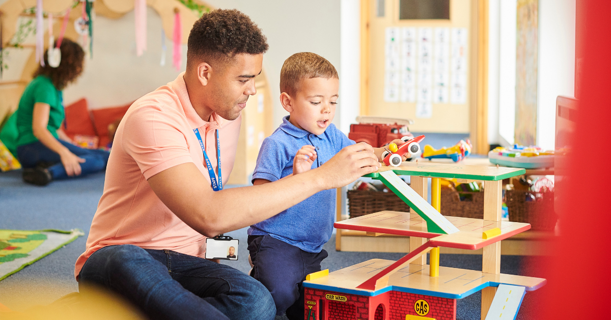 BLOG POST BANNER IMAGES ABA provider young ABA male teacher with preschool aged boy playing with a car set