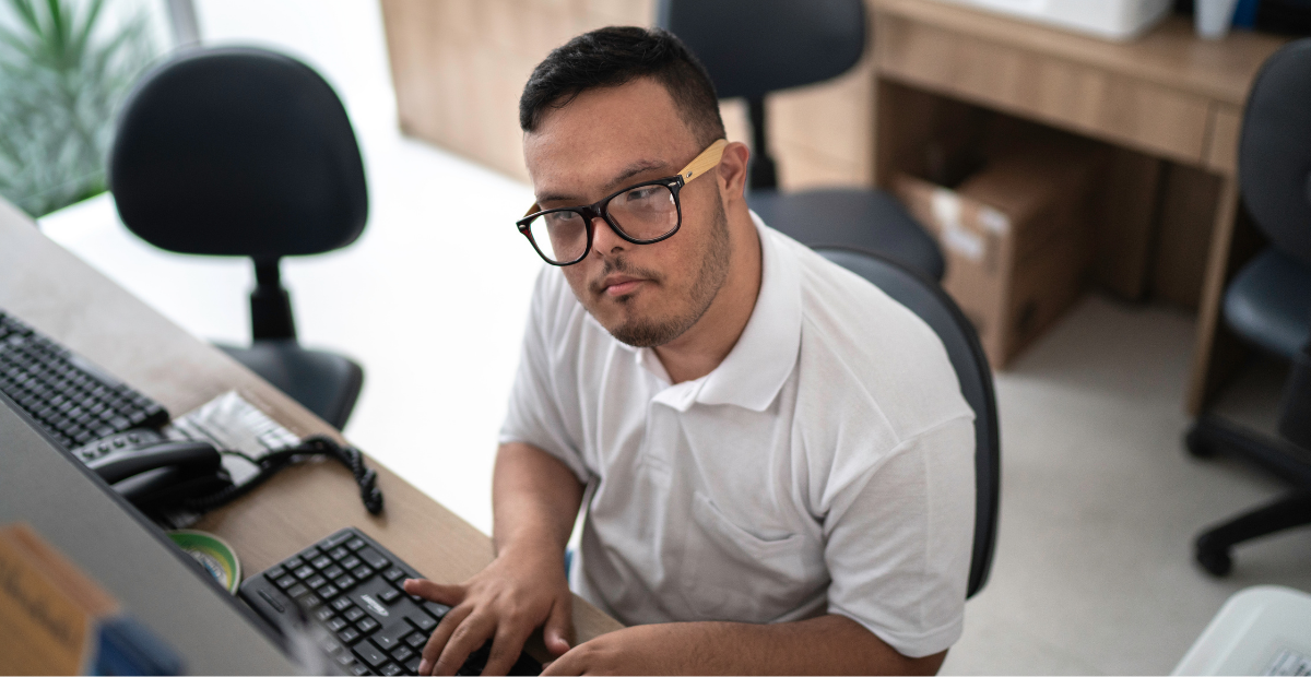 Disabled man working at a desk